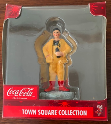 4326-1 € 8,00 coca cola town square man met geel pak.jpeg